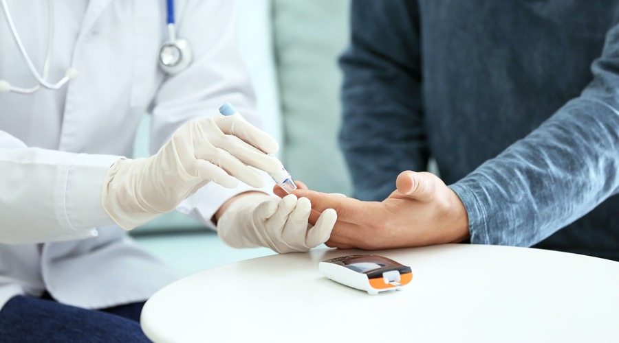 A man getting his regular diabetes screening from a GP in Epping Family Medical And Specialist Centre on Men's Health Awareness Month